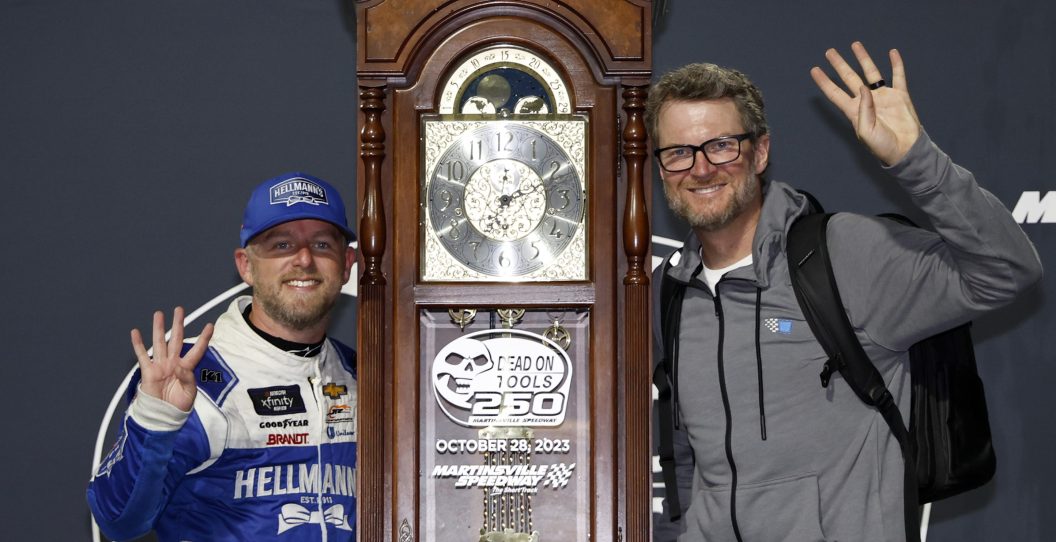MARTINSVILLE, VIRGINIA - OCTOBER 28: Justin Allgaier, driver of the #7 Hellmann's Chevrolet, (L) and NASCAR Hall of Famer and JR Motorsports owner, Dale Earnhardt Jr. celebrate in victory lane after winning the NASCAR Xfinity Series Dead On Tools 250 at Martinsville Speedway on October 28, 2023 in Martinsville, Virginia.