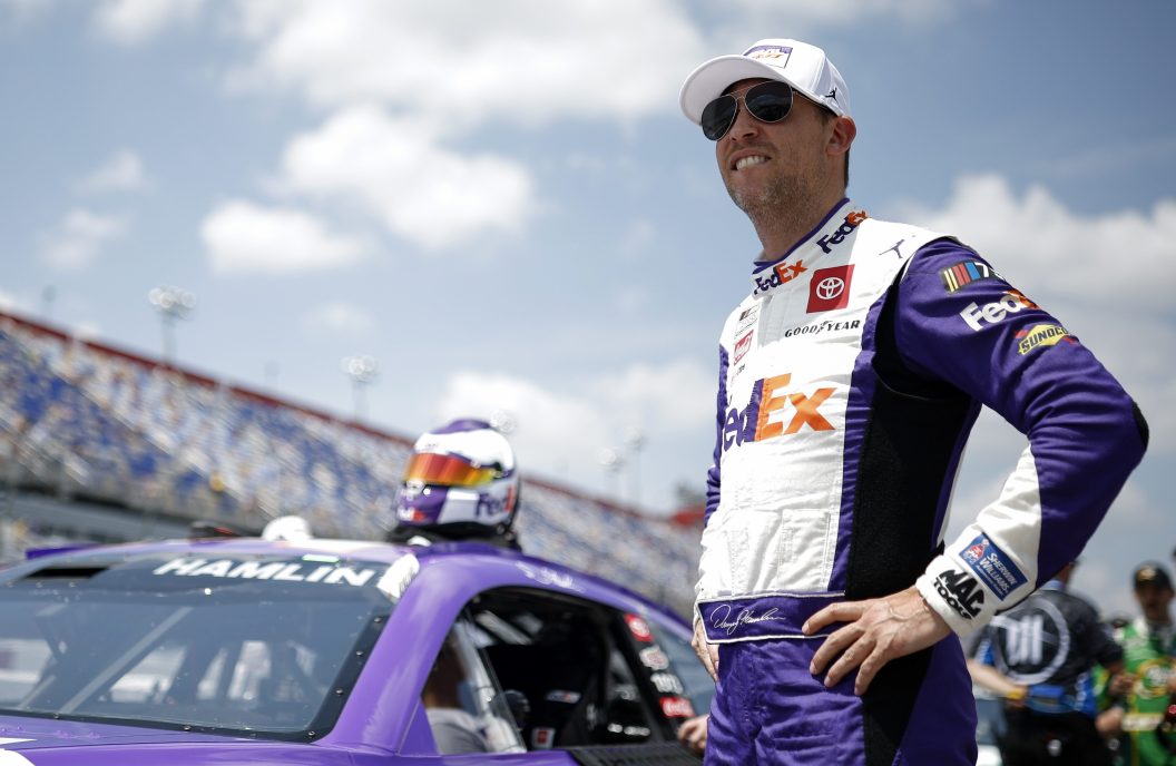 DARLINGTON, SOUTH CAROLINA - MAY 13: Denny Hamlin, driver of the #11 Federal Express Toyota, drives during qualifying for the NASCAR Cup Series Goodyear 400 at Darlington Raceway on May 13, 2023 in Darlington, South Carolina.