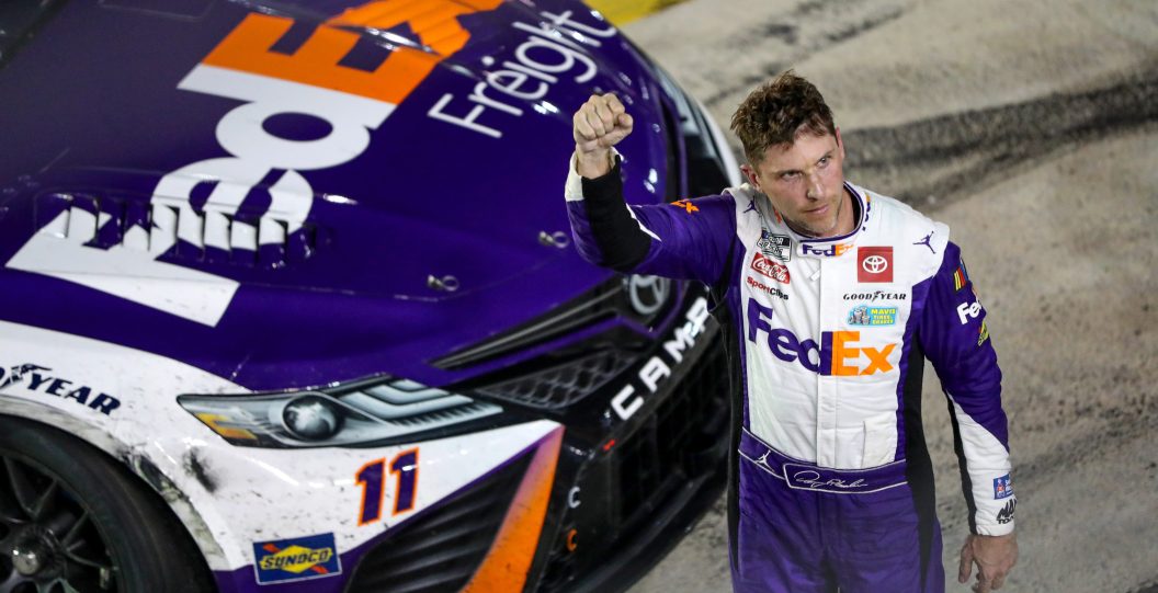 BRISTOL, TENNESSEE - SEPTEMBER 16: Denny Hamlin, driver of the #11 FedEx Freight Direct Toyota, celebrates after winning the NASCAR Cup Series Bass Pro Shops Night Race at Bristol Motor Speedway on September 16, 2023 in Bristol, Tennessee.