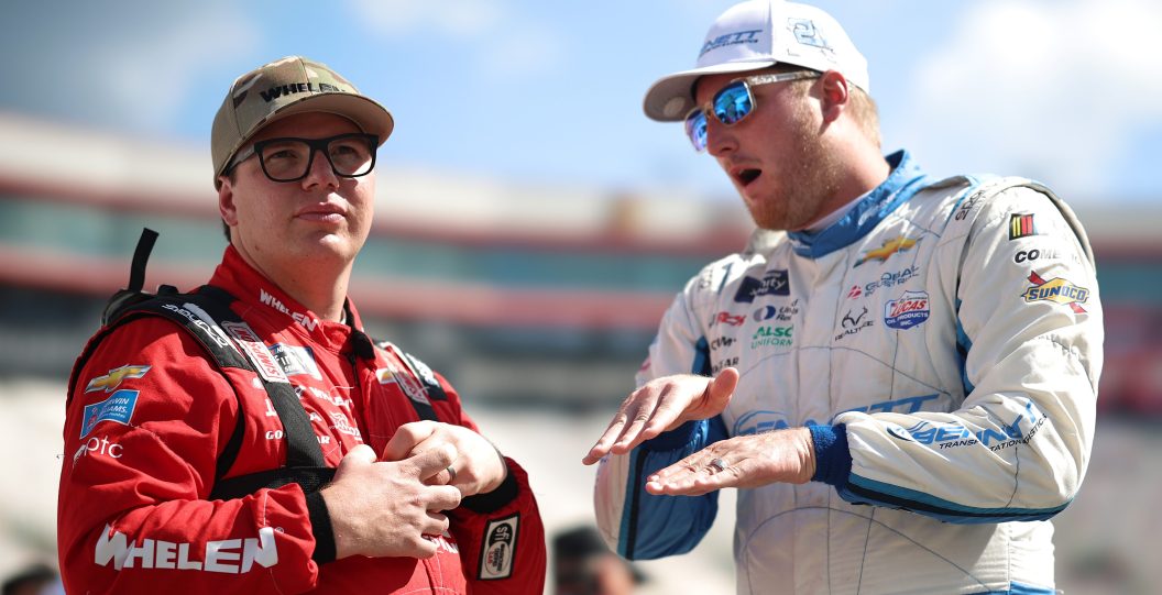 BRISTOL, TENNESSEE - SEPTEMBER 15: Austin Hill, driver of the #21 Bennett Transportation Chevrolet, (R) and Sheldon Creed, driver of the #2 Whelen Chevrolet, talk on the grid during qualifying for the NASCAR Xfinity Series Food City 300 at Bristol Motor Speedway on September 15, 2023 in Bristol, Tennessee.