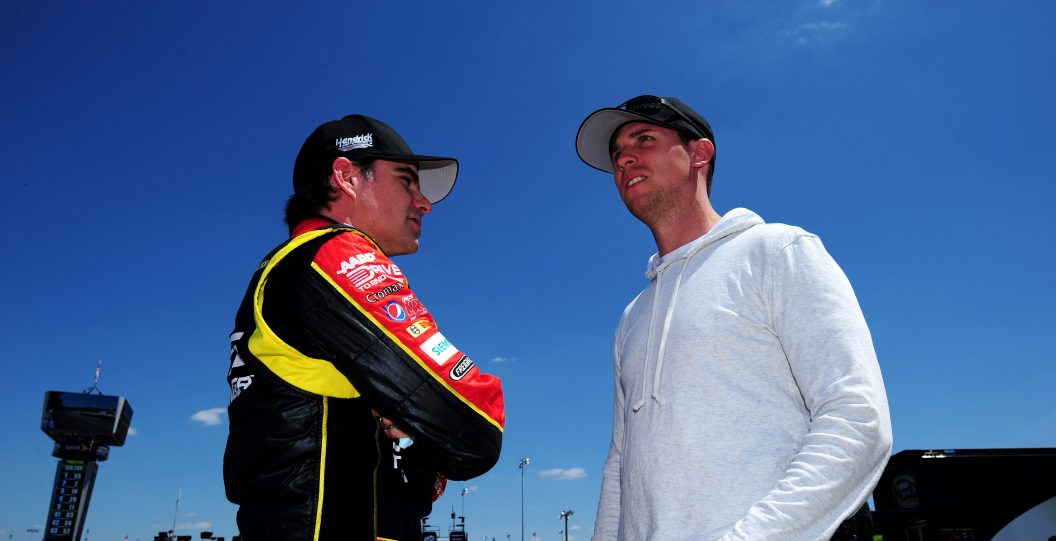 RICHMOND, VA - APRIL 26: Jeff Gordon (L), driver of the #24 Drive To End Hunger Chevrolet, talks with injured driver Denny Hamlin (R) in the garage during practice for the NASCAR Sprint Cup Series Toyota Owners 400 at Richmond International Raceway on April 26, 2013 in Richmond, Virginia.