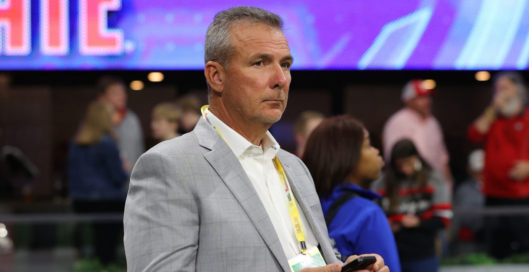 BIRMINGHAM, ALABAMA - MARCH 16: Urban Meyer looks on during the first round game of the NCAA Men's Basketball Tournament between the West Virginia Mountaineers and the Maryland Terrapins at Legacy Arena at the BJCC on March 16, 2023 in Birmingham, Alabama.