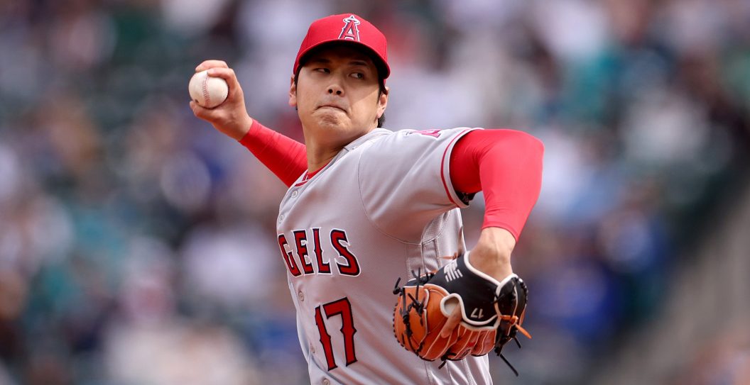 SEATTLE, WASHINGTON - APRIL 05: Shohei Ohtani #17 of the Los Angeles Angels pitches during the first inning against the Seattle Mariners at T-Mobile Park on April 05, 2023 in Seattle, Washington.