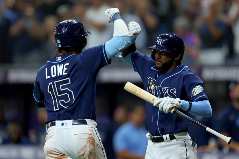 ST PETERSBURG, FLORIDA - APRIL 11: Josh Lowe #15 of the Tampa Bay Rays is congratulated after hitting a home run in the seventh inning during a game against the Boston Red Sox at Tropicana Field on April 11, 2023 in St Petersburg, Florida. 