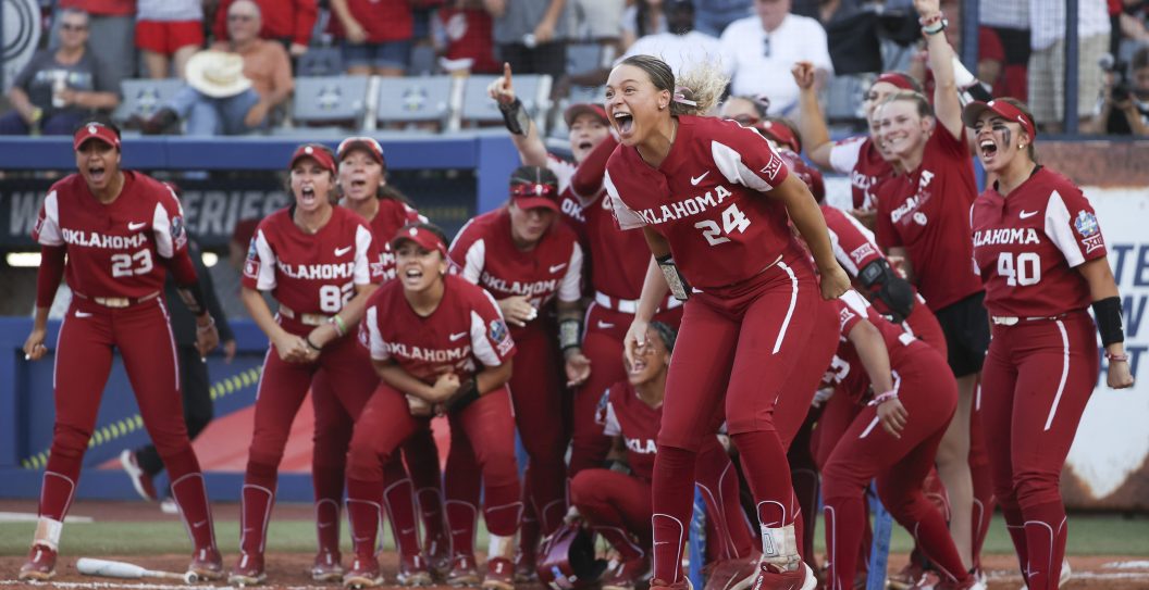 OKLAHOMA CITY, OK - JUNE 08: The Oklahoma Sooners cheer as Cydney Sanders #1 rounds the bases after hitting a home run during the Division I Womens Softball Championship against the Florida State Seminoles held at USA Softball Hall of Fame Stadium on June 7, 2023 in Oklahoma City, Oklahoma.