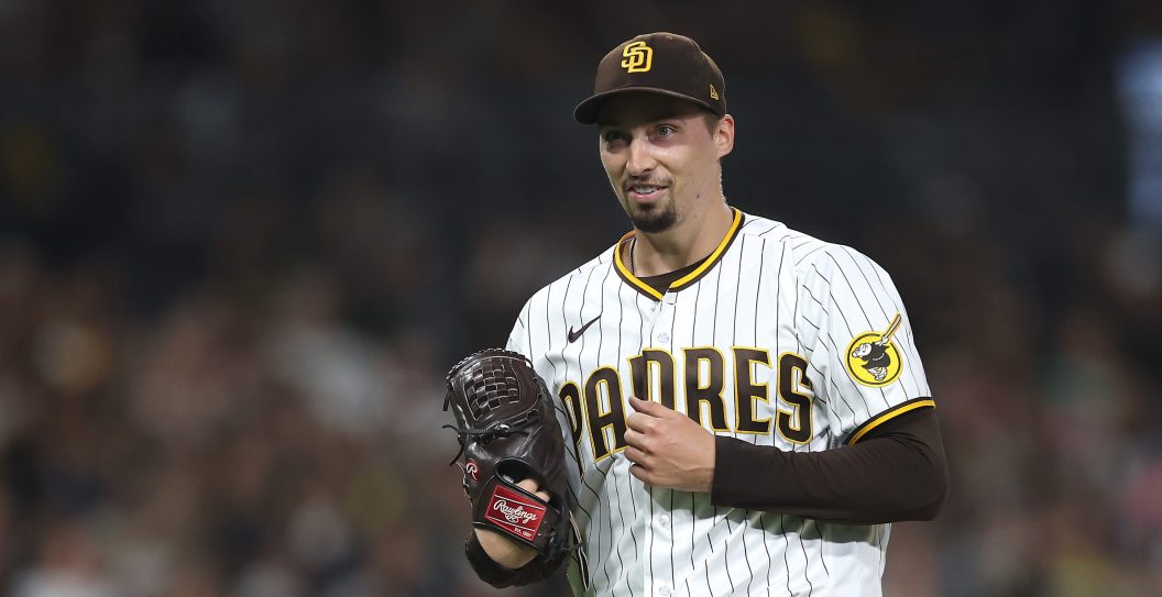SAN DIEGO, CALIFORNIA - SEPTEMBER 19: Blake Snell #4 of the San Diego Padres reacts as he walks to the dugout after throwing seven hitless innings a game against the Colorado Rockies at PETCO Park on September 19, 2023 in San Diego, California.