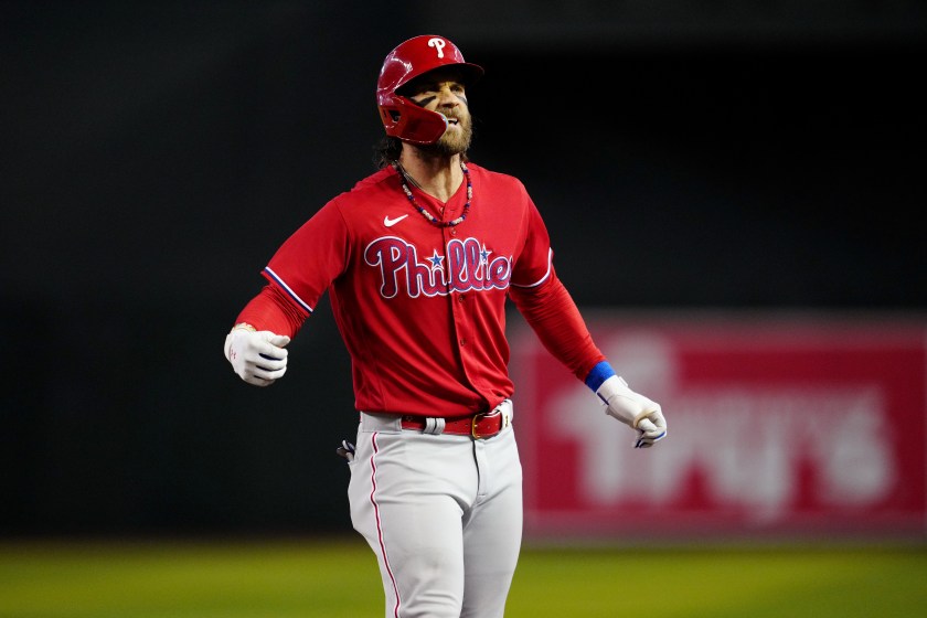 PHOENIX, AZ - OCTOBER 21:  Bryce Harper #3 of the Philadelphia Phillies celebrates after hitting a single in the first inning during Game 5 of the NLCS between the Philadelphia Phillies and the Arizona Diamondbacks at Chase Field on Saturday, October 21, 2023 in Phoenix, Arizona. 