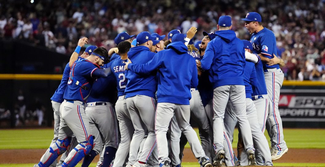 PHOENIX, AZ - NOVEMBER 01: Members of the Texas Rangers celebrate on the field after the Texas Rangers defeated the Arizona Diamondbacks in Game 5 of the 2023 World Series at Chase Field on Wednesday, November 1, 2023 in Phoenix, Arizona.