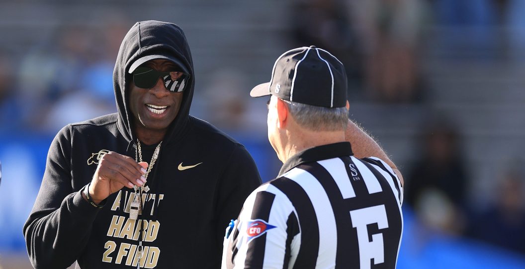 PASADENA, CALIFORNIA - OCTOBER 28: Head coach Deion Sanders of the Colorado Buffaloes speaks with officials prior to a game against the UCLA Bruins at Rose Bowl Stadium on October 28, 2023 in Pasadena, California.