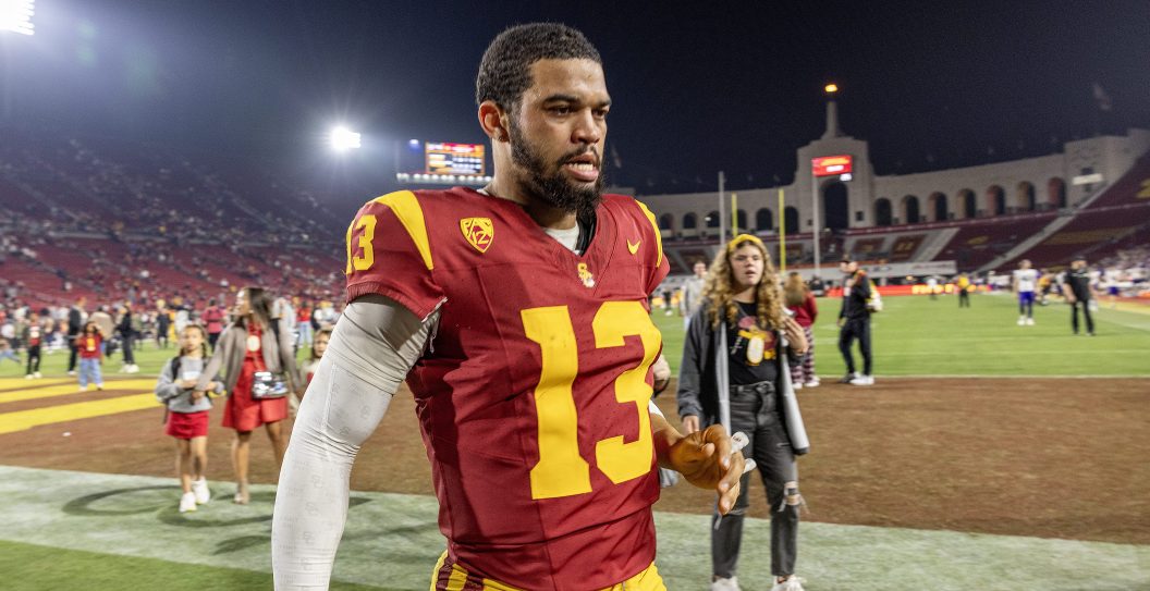 LOS ANGELES, CA - NOVEMBER 4, 2023: USC Trojans quarterback Caleb Williams (13) leaves the field with tears in his eyes after the Trojans 52-42 loss to Washington at L.A. Memorial Coliseum November 4, 2023 in Los Angeles, California.