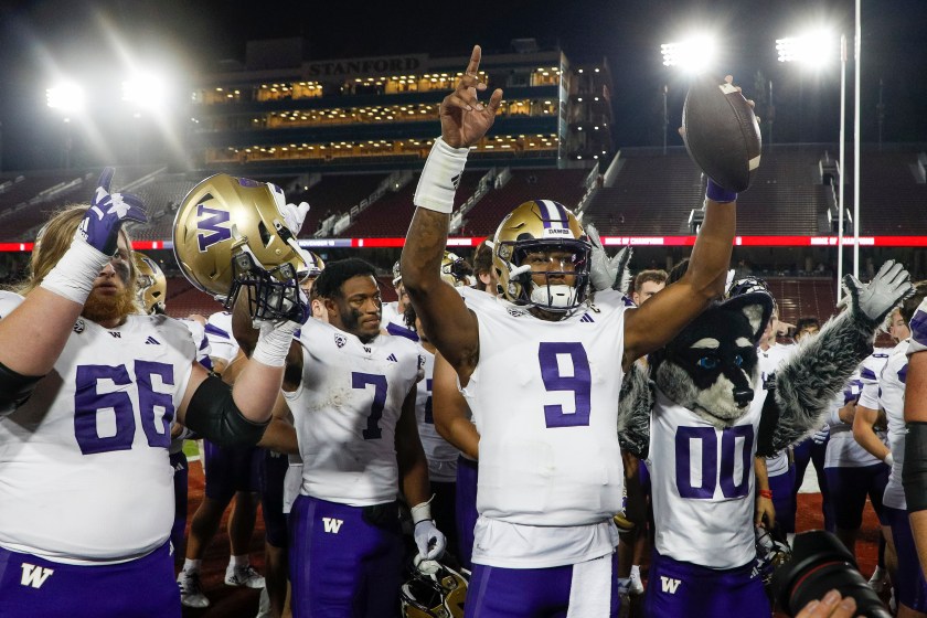STANFORD, CALIFORNIA - OCTOBER 28: Michael Penix Jr. #9 of the Washington Huskies celebrates a victory with teammates over the Stanford Cardinal at Stanford Stadium on October 28, 2023 in Stanford, California. 
