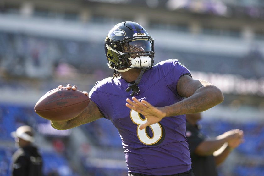 BALTIMORE, MARYLAND - NOVEMBER 05: Lamar Jackson #8 of the Baltimore Ravens throws a pass as he warms up prior to an NFL football game between the Baltimore Ravens and the Seattle Seahawks at M&T Bank Stadium on November 05, 2023 in Baltimore, Maryland. 