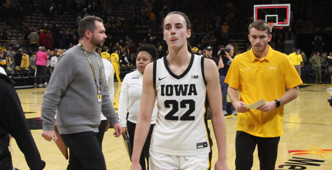 IOWA CITY, IOWA- NOVEMBER 16: Guard Caitlin Clark #22 of the Iowa Hawkeyes walks off the court after the upset against the Kansas State Wildcats at Carver-Hawkeye Arena on November 16, 2023 in Iowa City, Iowa.
