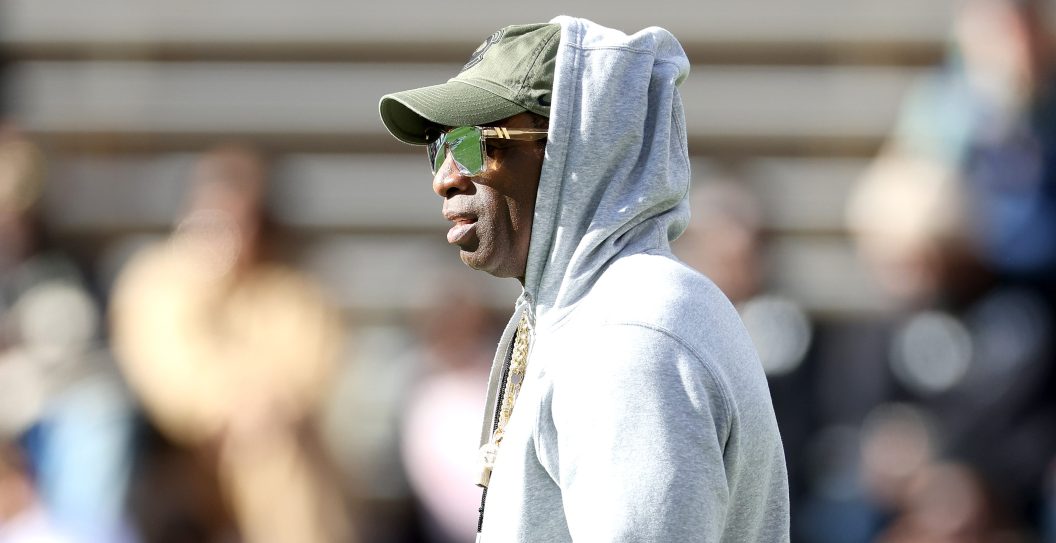 BOULDER, COLORADO - NOVEMBER 11: Head coach Deion Sanders of the Colorado Buffaloes watches as his team warms-up in pregame prior to playing the Arizona Wildcats at Folsom Field on November 11, 2023 in Boulder, Colorado.