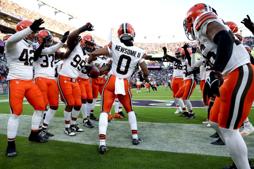 BALTIMORE, MARYLAND - NOVEMBER 12: Greg Newsome II #0 of the Cleveland Browns celebrates a touchdown with teammates against the Baltimore Ravens during the fourth quarter at M&T Bank Stadium on November 12, 2023 in Baltimore, Maryland. 