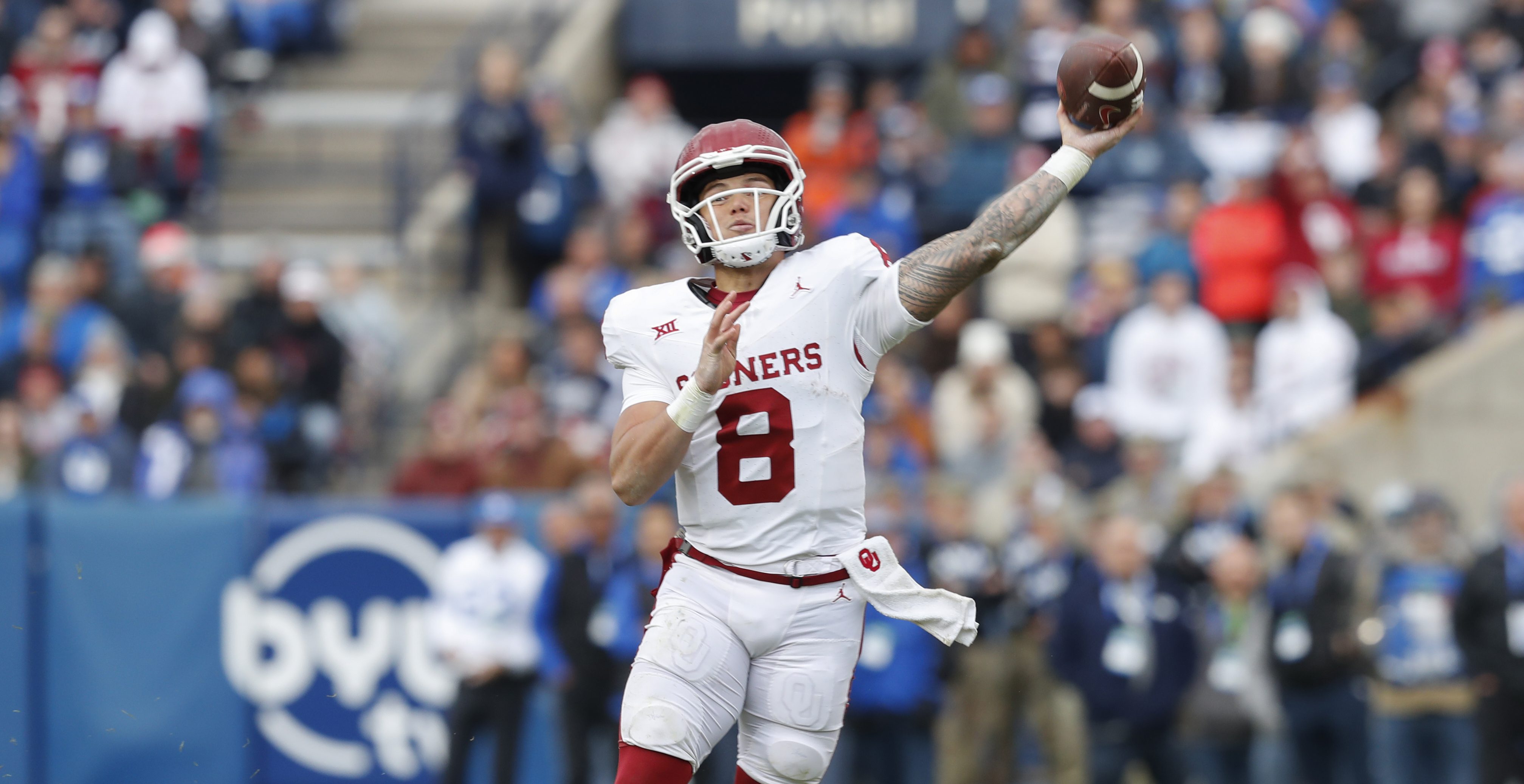 PROVO, UT - NOVEMBER 18: Dillon Gabriel #8 of the Oklahoma Sooners throws a touchdown pass during the first half of their game against the Brigham Young Cougars at LaVell Edwards Stadium on November 18, 2023 in Provo, Utah.