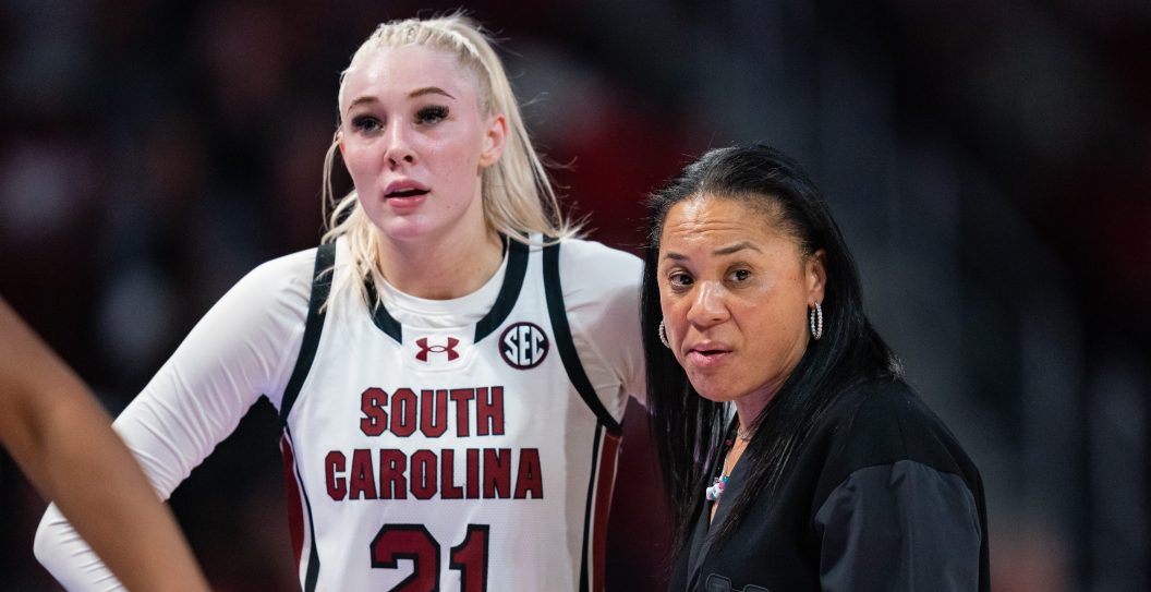 COLUMBIA, SOUTH CAROLINA - NOVEMBER 12: Head coach Dawn Staley talks with Chloe Kitts #21 of the South Carolina Gamecocks during their game against the Maryland Terrapins at Colonial Life Arena on November 12, 2023 in Columbia, South Carolina.