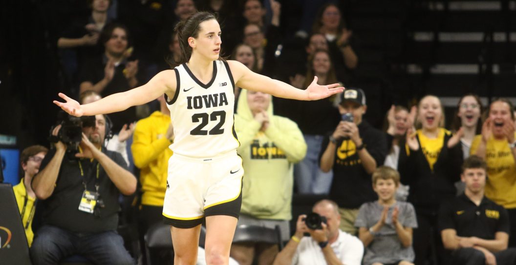 IOWA CITY, IOWA- NOVEMBER 19: Guard Caitlin Clark #22 of the Iowa Hawkeyes gestures to the crowd after a basket during the second half against the Drake Bulldogs at Carver-Hawkeye Arena on November 19, 2023 in Iowa City, Iowa.