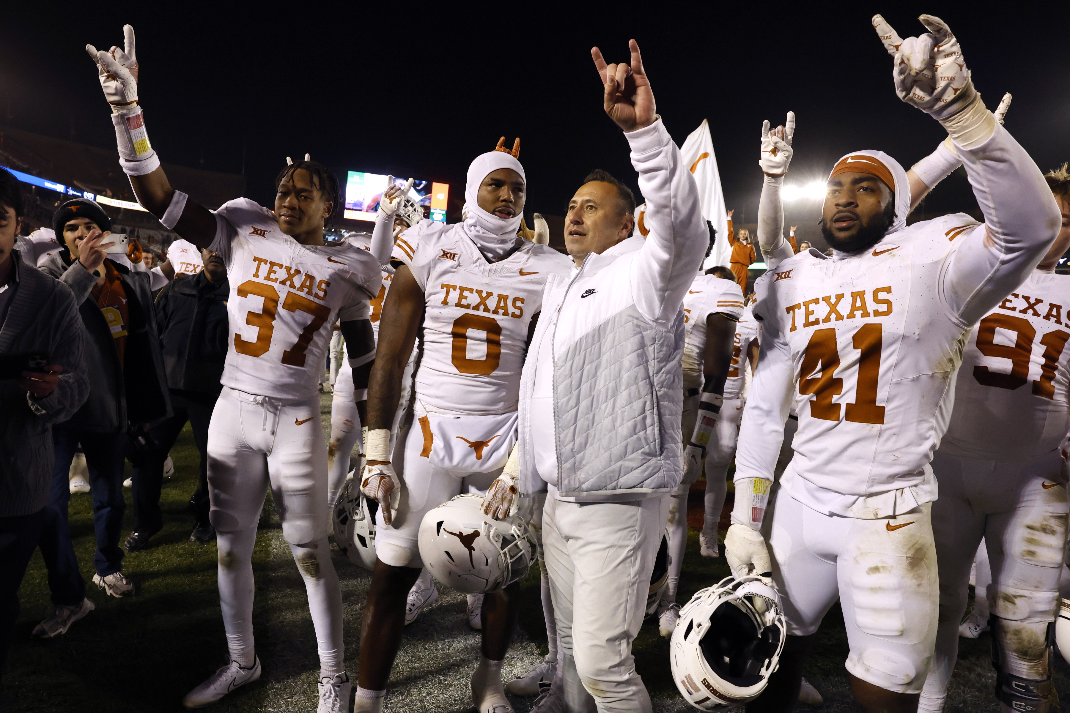 AMES, IA - NOVEMBER 18: Steve Sarkisian head coach of the Texas Longhorns celebrates with his team and Texas Longhorns fans after winning 26-16 over the Iowa State Cyclones at Jack Trice Stadium on November 18, 2023 in Ames, Iowa. The Texas Longhorns won 26-16 over the Iowa State Cyclones. 