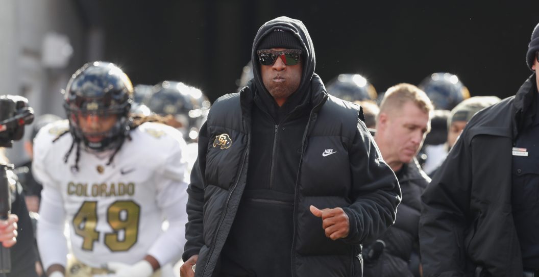 SALT LAKE CITY, UT - NOVEMBER 25: Deion Sanders head coach of the Colorado Buffaloes leads his team onto the field before the start of their game agaisnt the Utah Utes at Rice Eccles Stadium on November 25, 2023 in Salt Lake City, Utah.