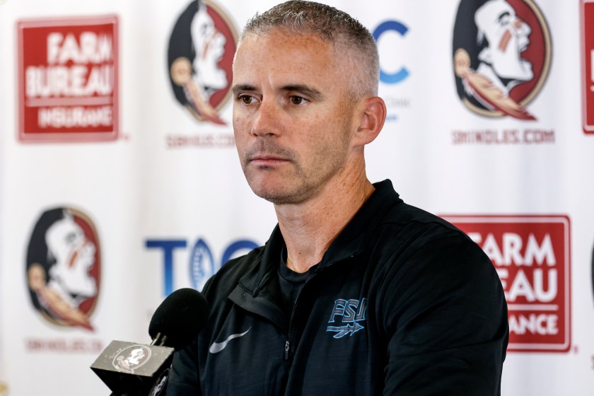 Mike Norvell speaks at a press conference.