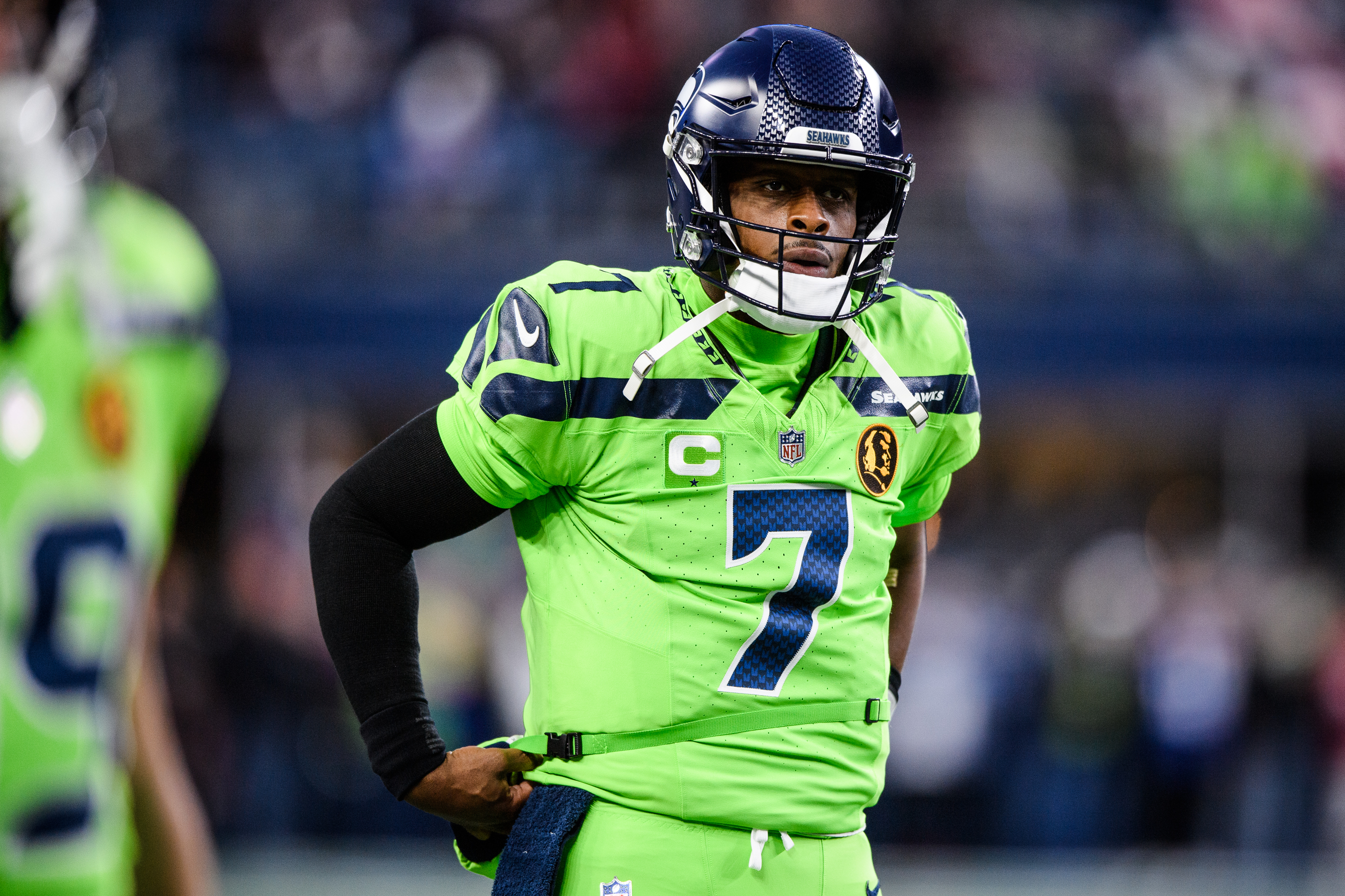 SEATTLE, WASHINGTON - NOVEMBER 23: Seattle Seahawks quarterback Geno Smith #7 warms up before the game against the San Francisco 49ers at Lumen Field on November 23, 2023 in Seattle, Washington. 