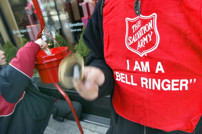 A Salvation Army bell ringer collects donations.