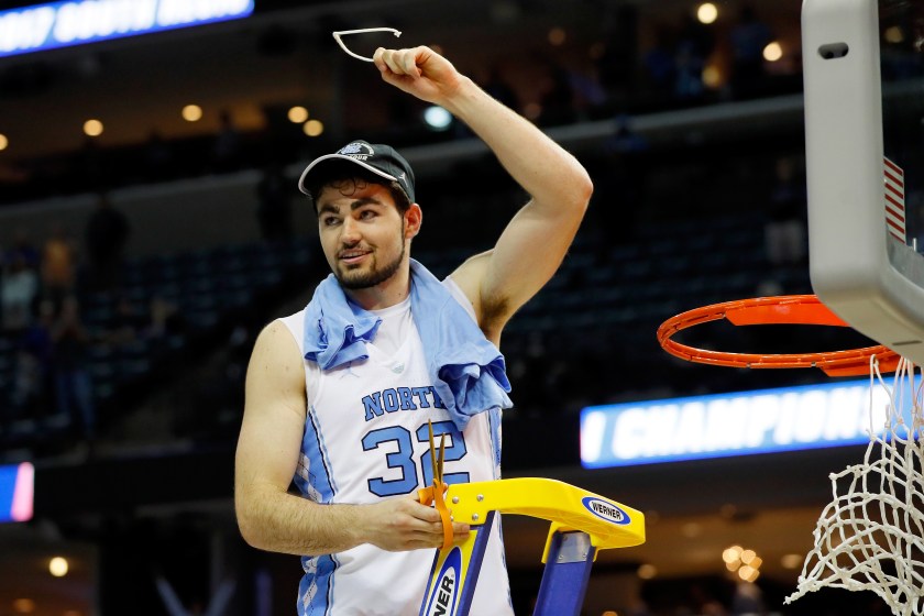 MEMPHIS, TN - MARCH 26: Luke Maye #32 of the North Carolina Tar Heels cuts down the net after making the game winning shot and defeating the Kentucky Wildcats during the 2017 NCAA Men's Basketball Tournament South Regional at FedExForum on March 26, 2017 in Memphis, Tennessee.  