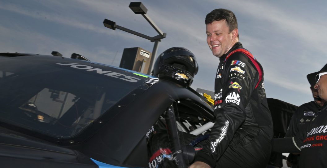 MADISON, ILLINOIS - JUNE 03: Erik Jones, driver of the #43 Bommarito.com Chevrolet, enters his car during qualifying for the NASCAR Cup Series Enjoy Illinois 300 at WWT Raceway on June 03, 2023 in Madison, Illinois.