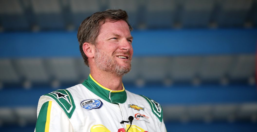 MARTINSVILLE, VIRGINIA - AUGUST 22: NASCAR Hall of Famer Dale Earnhardt Jr. stands in the garage area during the Mazda MX-5 Cup Test at Martinsville Speedway on August 22, 2023 in Martinsville, Virginia.