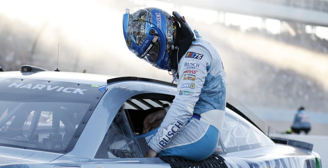 AVONDALE, ARIZONA - NOVEMBER 05: Kevin Harvick, driver of the #4 Busch Light Harvick Ford, exits his car after the NASCAR Cup Series Championship at Phoenix Raceway on November 05, 2023 in Avondale, Arizona.