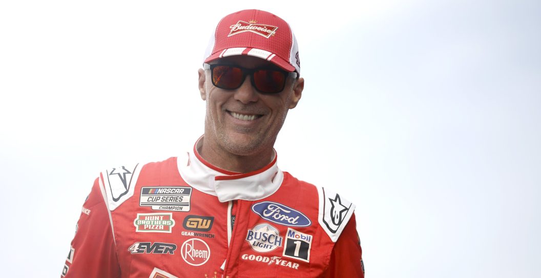 HOMESTEAD, FLORIDA - OCTOBER 22: Kevin Harvick, driver of the #4 Budweiser Ford, walks onstage during driver intros prior to the NASCAR Cup Series 4EVER 400 Presented by Mobil 1 at Homestead-Miami Speedway on October 22, 2023 in Homestead, Florida.