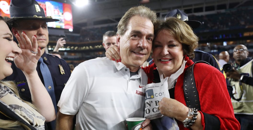 MIAMI, FL - DECEMBER 29: Head coach Nick Saban of the Alabama Crimson Tide celebrates with his wife after the win over the Oklahoma Sooners during the College Football Playoff Semifinal at the Capital One Orange Bowl at Hard Rock Stadium on December 29, 2018 in Miami, Florida.
