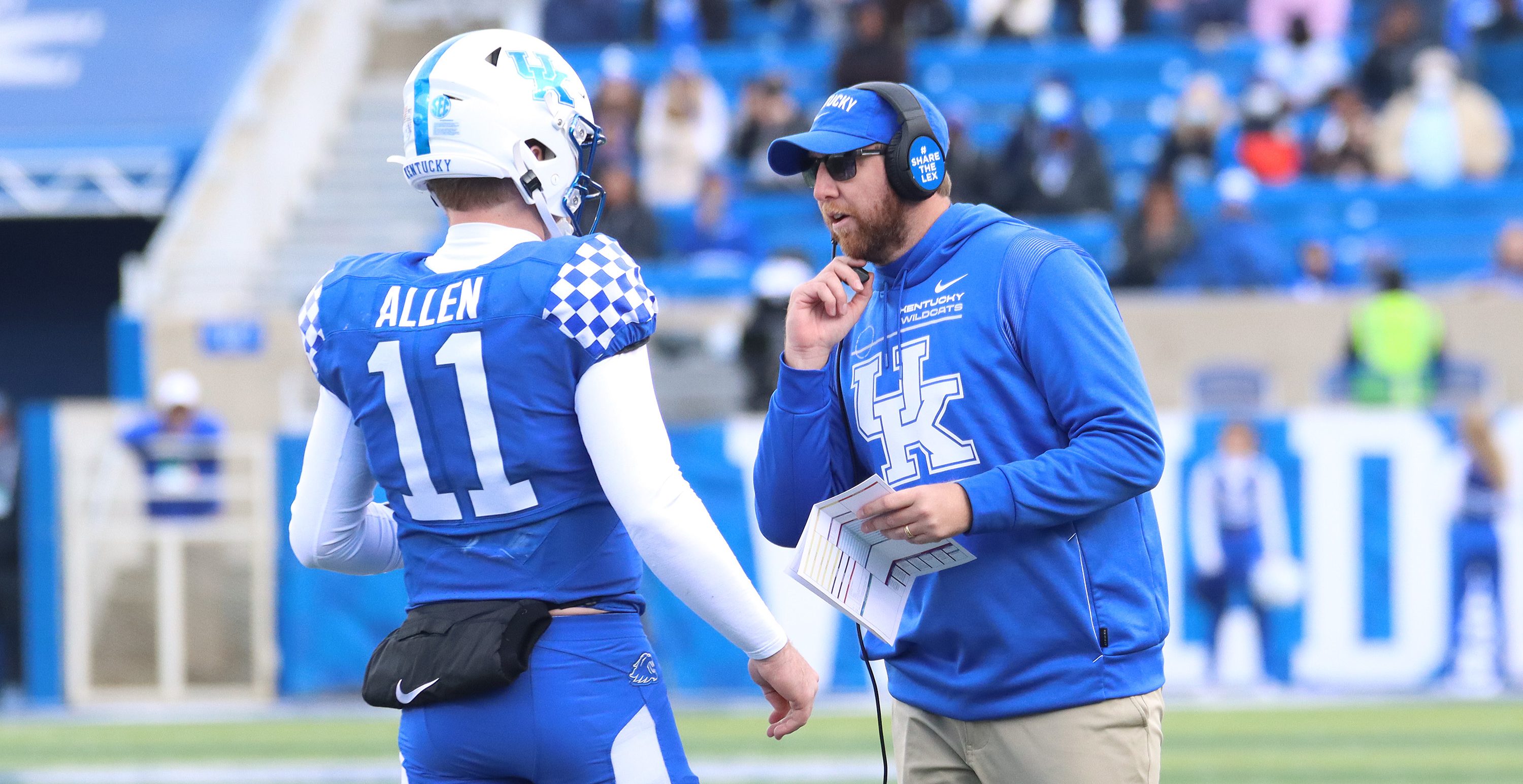 LEXINGTON, KY - NOVEMBER 20: Kentucky Wildcats offensive coordinator Liam Coen talks with quarterback Beau Allen (11) in a game between the New Mexico State Aggies and the Kentucky Wildcats on November 20, 2021, at Kroger Field in Lexington, KY.