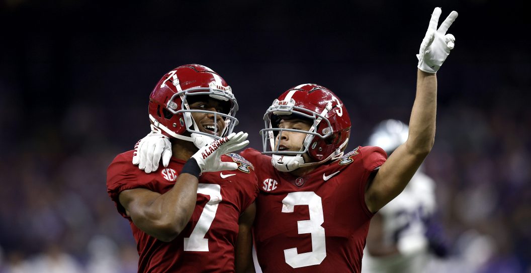NEW ORLEANS, LOUISIANA - DECEMBER 31: Ja'Corey Brooks #7 of the Alabama Crimson Tide reacts with Jermaine Burton #3 of the Alabama Crimson Tide after scoring a touchdwon during the third quarter of the Allstate Sugar Bowl against the Kansas State Wildcats at Caesars Superdome on December 31, 2022 in New Orleans, Louisiana.