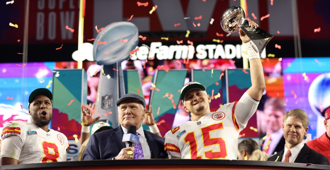 GLENDALE, ARIZONA - FEBRUARY 12: Patrick Mahomes #15 of the Kansas City Chiefs celebrates with the the Vince Lombardi Trophy after defeating the Philadelphia Eagles 38-35 in Super Bowl LVII at State Farm Stadium on February 12, 2023 in Glendale, Arizona.