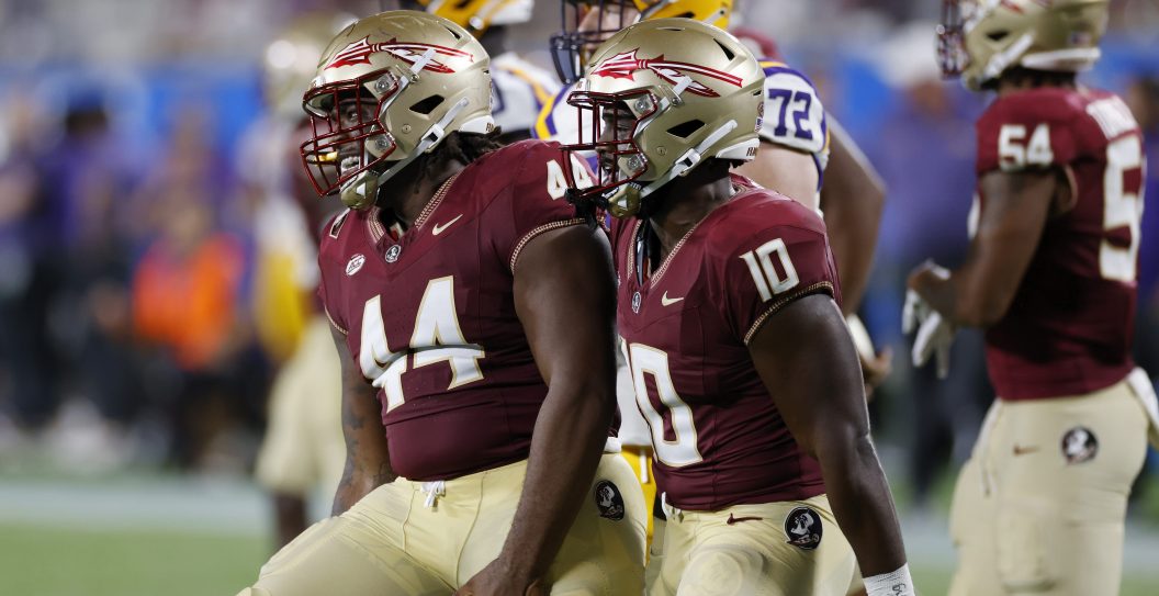 ORLANDO, FL - SEPTEMBER 03: Florida State Seminoles defensive lineman Joshua Farmer (44) and linebacker DJ Lundy (10) celebrate during a college football game against the LSU Tigers on September 03, 2023 at Camping World Stadium in Orlando, Florida.