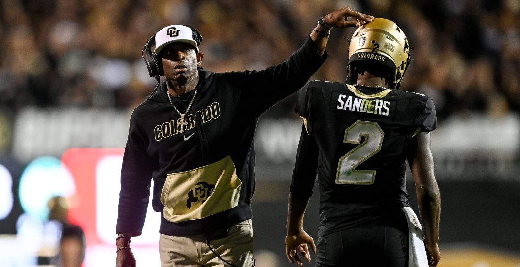 BOULDER, CO - SEPTEMBER 16: Head coach Deion Sanders of the Colorado Buffaloes celebrates with quarterback Shedeur Sanders #2 after a fourth quarter touchdown against the Colorado State Rams at Folsom Field on September 16, 2023 in Boulder, Colorado.
