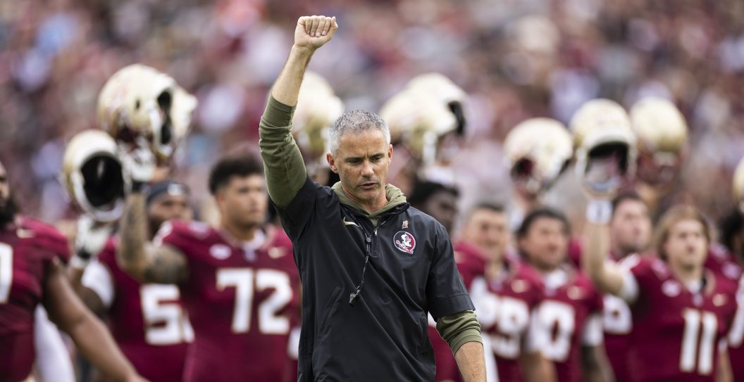 TALLAHASSEE, FLORIDA - NOVEMBER 11: Head coach Mike Norvell of the Florida State Seminoles looks on before the start of a game against the Miami Hurricanes at Doak Campbell Stadium on November 11, 2023 in Tallahassee, Florida.