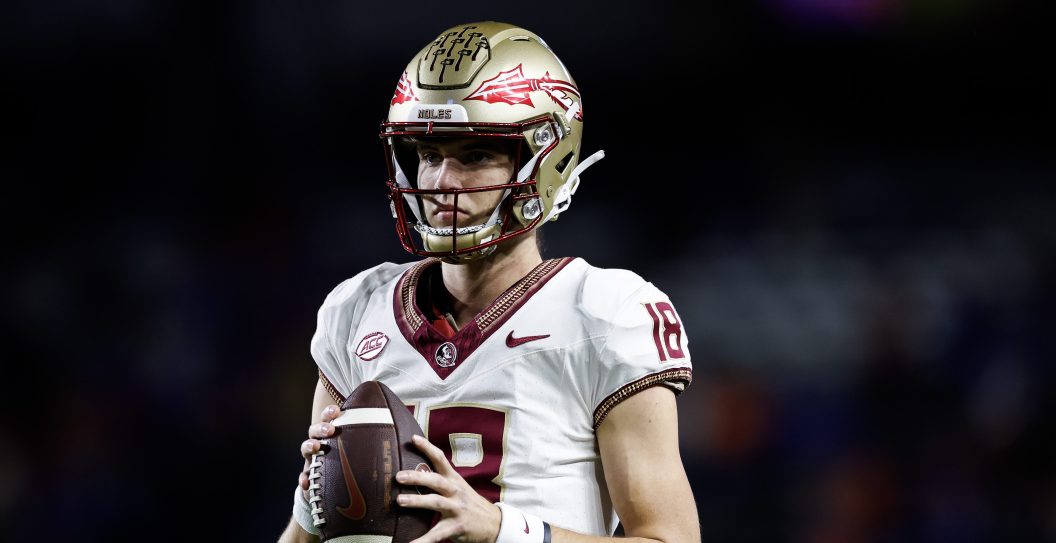 GAINESVILLE, FLORIDA - NOVEMBER 25: Tate Rodemaker #18 of the Florida State Seminoles warms up before the start of a game against the Florida Gators at Ben Hill Griffin Stadium on November 25, 2023 in Gainesville, Florida.