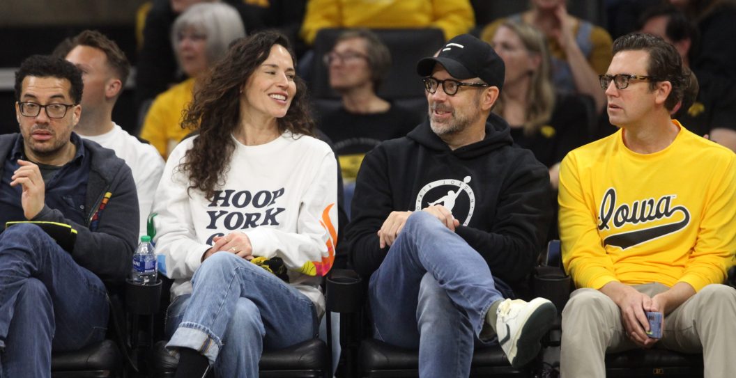 IOWA CITY, IOWA- December 02: Former WNBA player Sue Bird and actor Jason Sudeikis watch the match-up between the Iowa Hawkeyes and the Bowling Green Falcons at Carver-Hawkeye Arena on December 2, 2023 in Iowa City, Iowa.