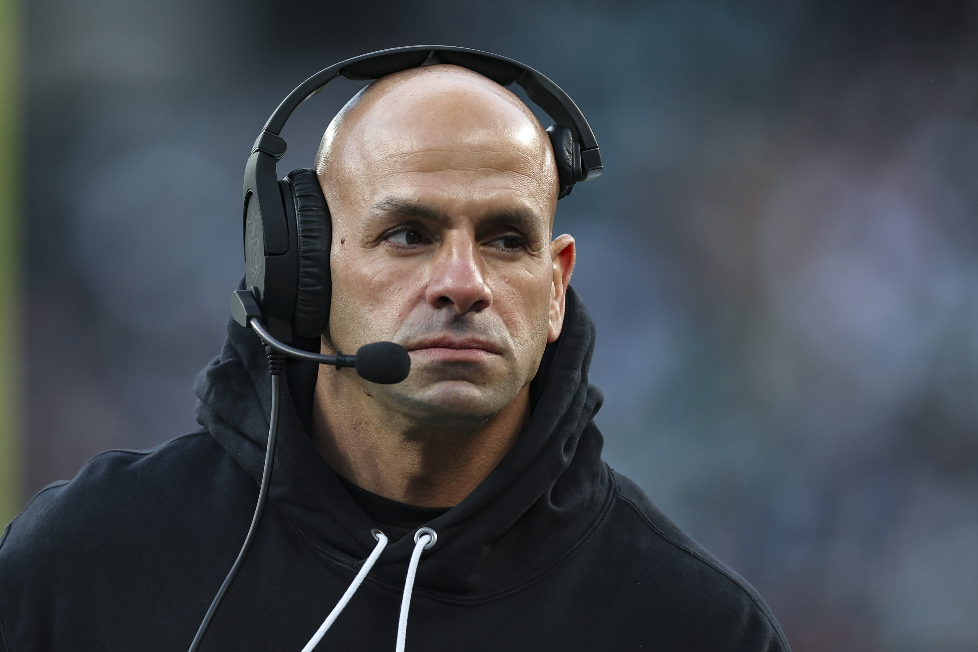 EAST RUTHERFORD, NJ - NOVEMBER 24: Robert Saleh of the New York Jets looks on from the sideline during an NFL football game against the Miami Dolphins at MetLife Stadium on November 24, 2023 in East Rutherford, New Jersey. 