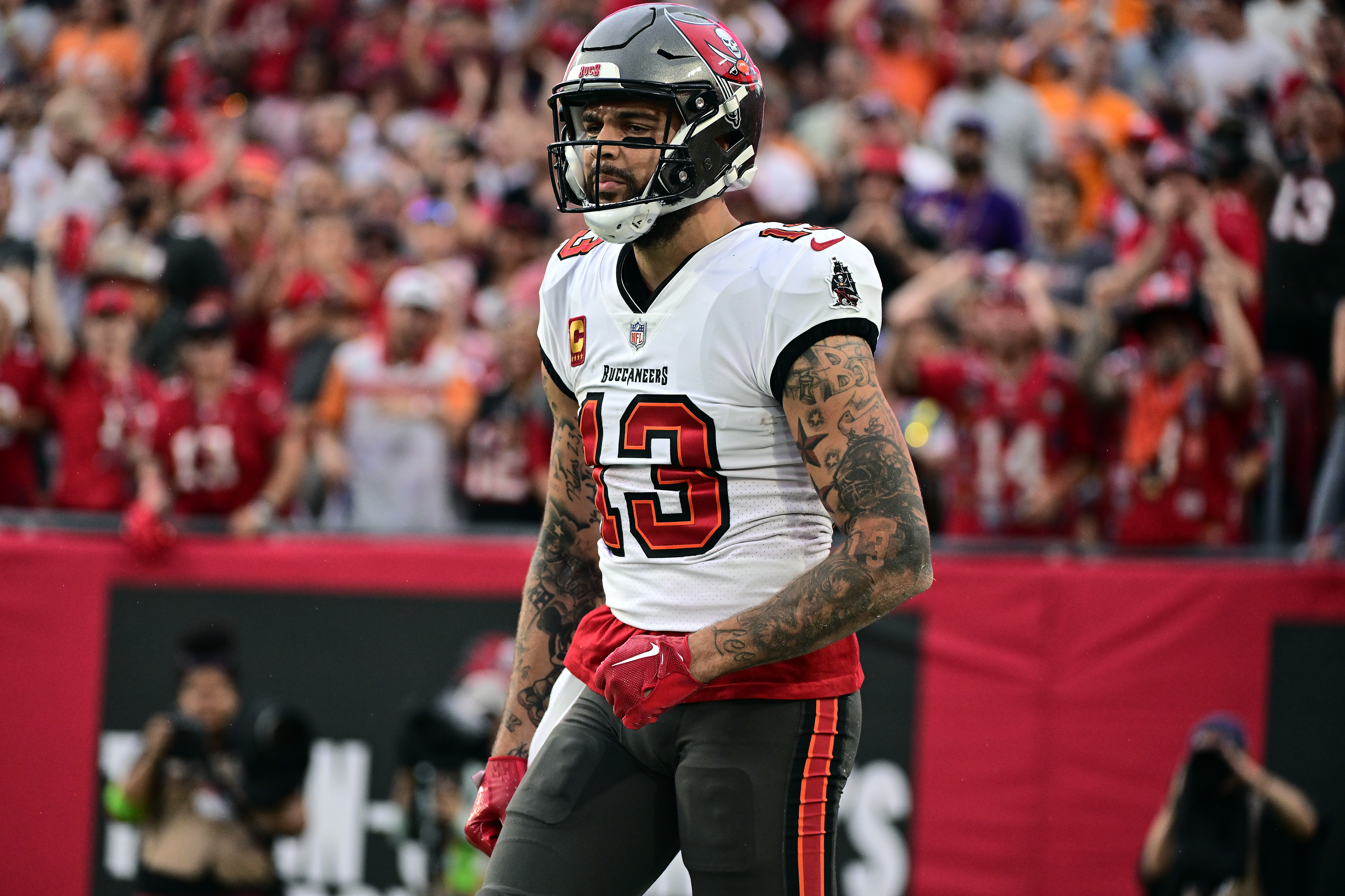 TAMPA, FLORIDA - DECEMBER 03: Mike Evans #13 of the Tampa Bay Buccaneers reacts after a reception against the Carolina Panthers during the first quarter at Raymond James Stadium on December 03, 2023 in Tampa, Florida. 