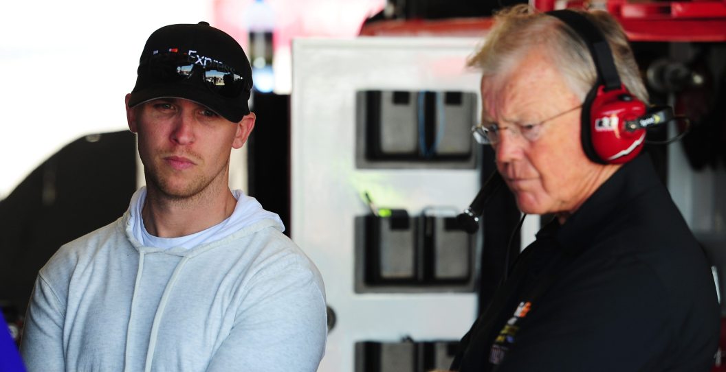 RICHMOND, VA - APRIL 26: Injured driver Denny Hamlin (L) chats with car owner Joe Gibbs (R) in the garage during practice for the NASCAR Sprint Cup Series Toyota Owners 400 at Richmond International Raceway on April 26, 2013 in Richmond, Virginia.