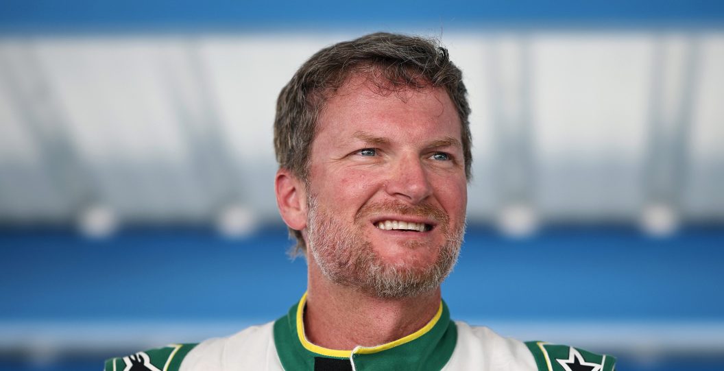 MARTINSVILLE, VIRGINIA - AUGUST 22: NASCAR Hall of Famer Dale Earnhardt Jr. stands in the garage area during the Mazda MX-5 Cup Test at Martinsville Speedway on August 22, 2023 in Martinsville, Virginia.