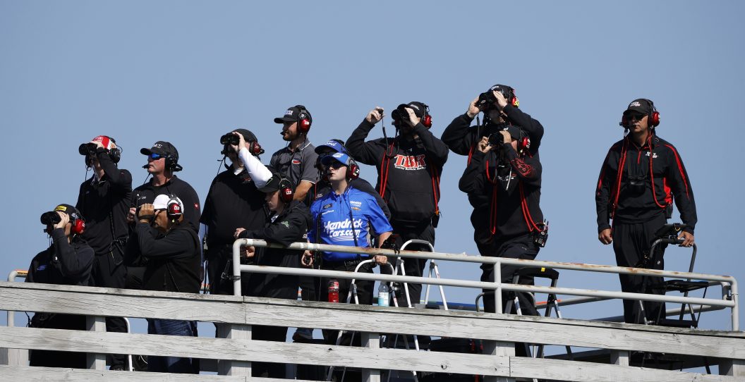 WATKINS GLEN, NEW YORK - AUGUST 19: ASCAR team spotters watch the race during the NASCAR Xfinity Series Shriners Children's 200 at The Glen at Watkins Glen International on August 19, 2023 in Watkins Glen, New York.