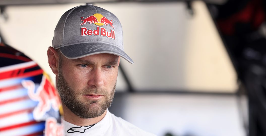 INDIANAPOLIS, INDIANA - AUGUST 11: Shane Van Gisbergen, driver of the #41 Worldwide Express Chevrolet, waits in the garage area during practice for the NASCAR Craftsman Truck Series TSport 200 at Indianapolis Raceway Park on August 11, 2023 in Indianapolis, Indiana.