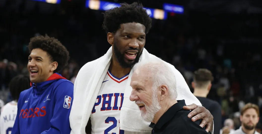 SAN ANTONIO, TX - FEBRUARY 03: Joel Embiid #21 of the Philadelphia 76ers greets head coach Gregg Popovich of the San Antonio Spurs at the end of their game at AT&T Center on February 03, 2023 in San Antonio, Texas. NOTE TO USER: User expressly acknowledges and agrees that, by downloading and or using this photograph, User is consenting to terms and conditions of the Getty Images License Agreement.