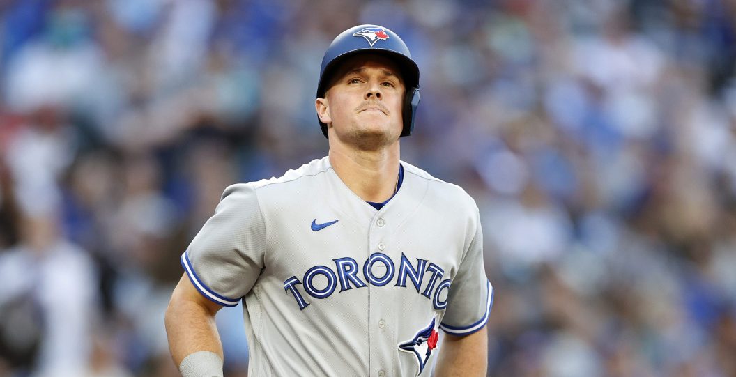 SEATTLE, WASHINGTON - JULY 07: Matt Chapman #26 of the Toronto Blue Jays reacts after he was hit by a pitch against the Seattle Mariners at T-Mobile Park on July 07, 2022 in Seattle, Washington.