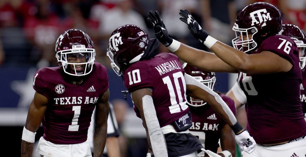 ARLINGTON, TEXAS - SEPTEMBER 24: Wide receiver Evan Stewart #1 of the Texas A&M Aggies celebrates after scoring a touchdown against the Arkansas Razorbacks in the fourth quarter of the 2022 Southwest Classic at AT&T Stadium on September 24, 2022 in Arlington, Texas.